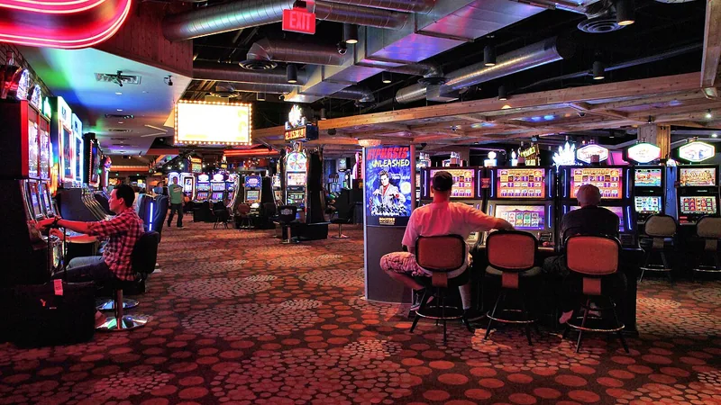 Rows of slot machines on a casino floor